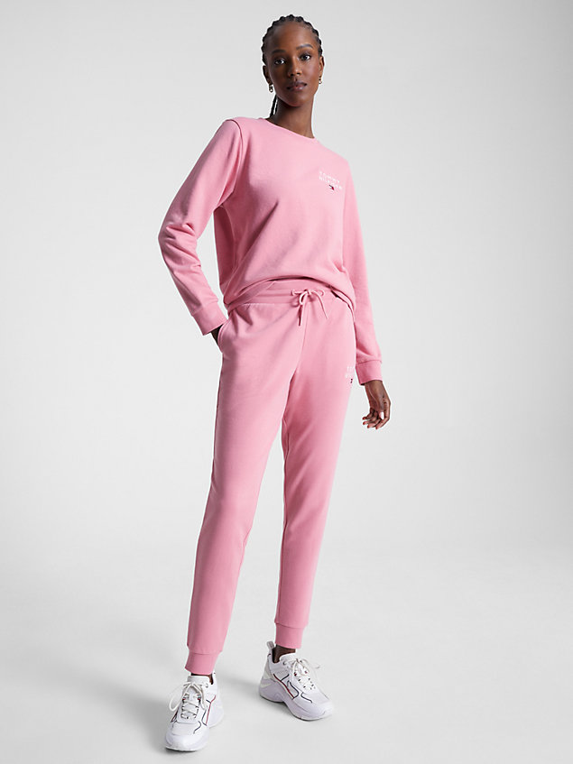 pink joggery ze zwężanymi nogawkami z mankietami dla kobiety - tommy hilfiger