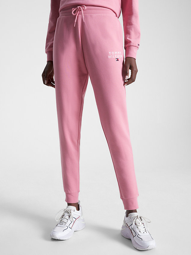 pink joggery ze zwężanymi nogawkami z mankietami dla kobiety - tommy hilfiger