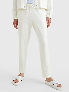 white tape drawstring tapered fit trousers for women tommy hilfiger