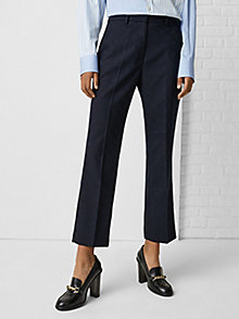 blue th monogram kick flare slim fit trousers for women tommy hilfiger
