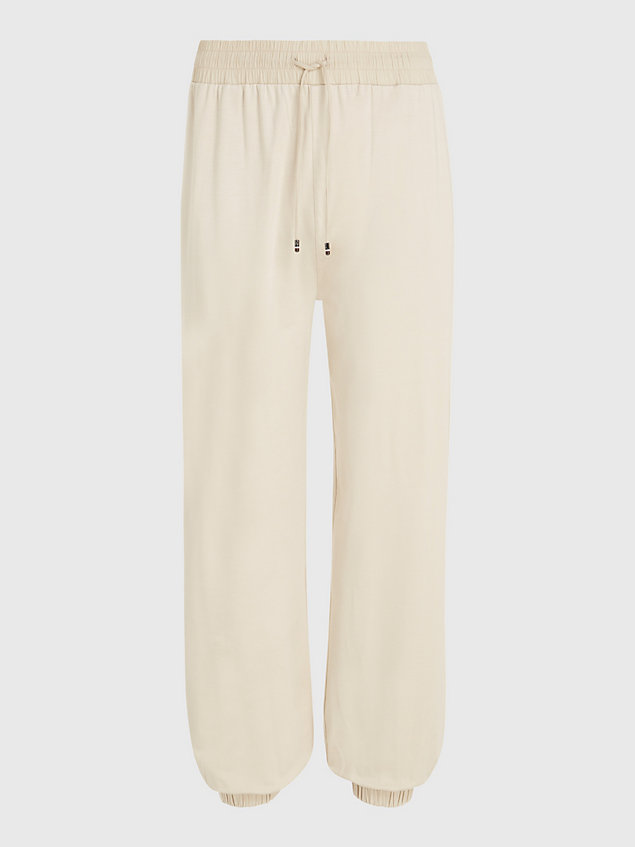 beige drawstring tapered cuffed leg trousers for women tommy hilfiger