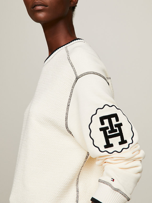 beige th monogram textured regular fit sweatshirt for women tommy hilfiger
