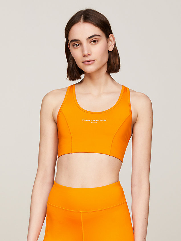 orange sport essential signature skinny medium support bra for women tommy hilfiger