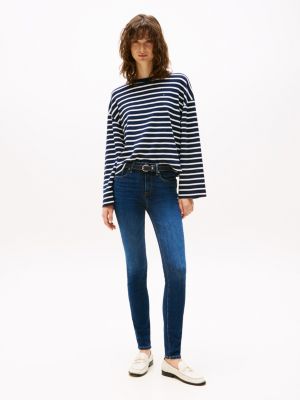 vaqueros como ceñidos de talle medio en azul oscuro blue de mujeres tommy hilfiger