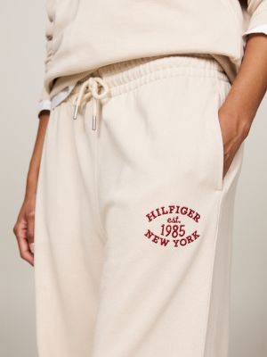 beige varsity logo embroidery joggers for women tommy hilfiger