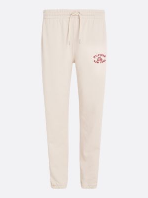 beige varsity logo embroidery joggers for women tommy hilfiger