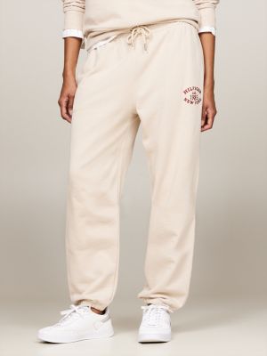 beige varsity logo embroidery joggers for women tommy hilfiger