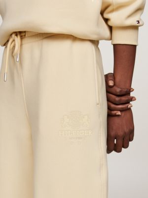 beige jogginghose mit bündchen und logo-stickerei für damen - tommy hilfiger