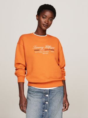 orange rundhals-sweatshirt mit schreibschrift-logo für damen - tommy hilfiger