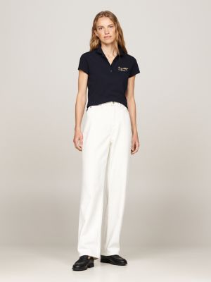 blauw slim poloshirt met scriptlogo voor dames - tommy hilfiger