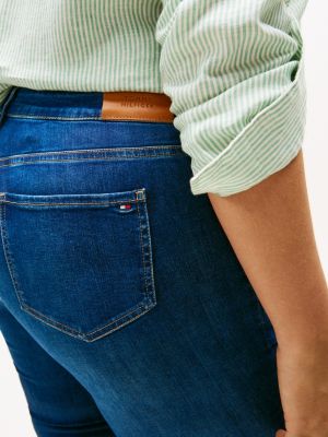 vaqueros curve harlem ceñidos de talle alto con efecto desteñido denim de mujeres tommy hilfiger