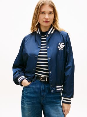 blue waterafstotend bomberjack met logo-appliqué voor dames - tommy hilfiger