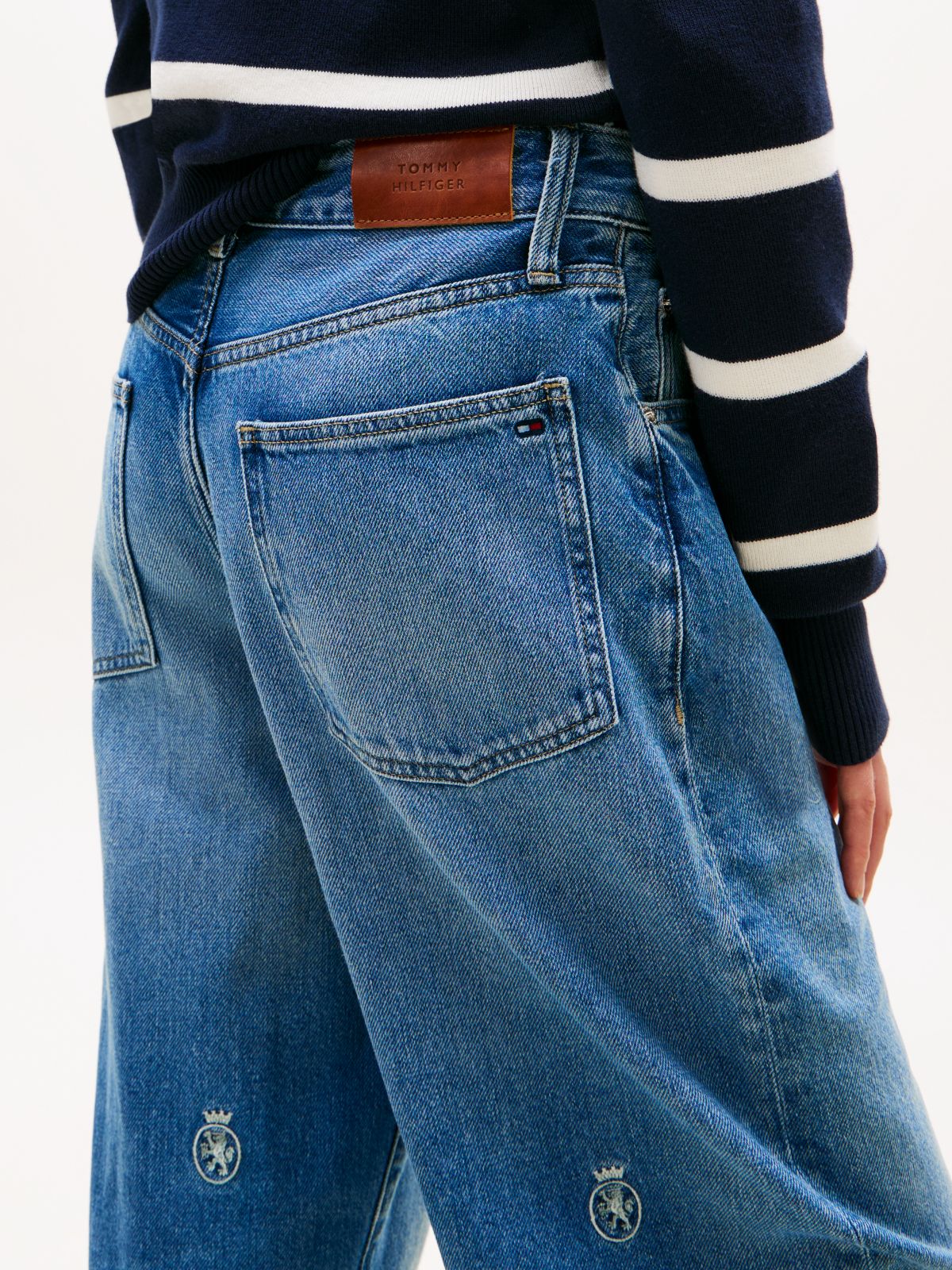 Crest Embroidery Mid Rise Barrel Leg Jeans — Blue