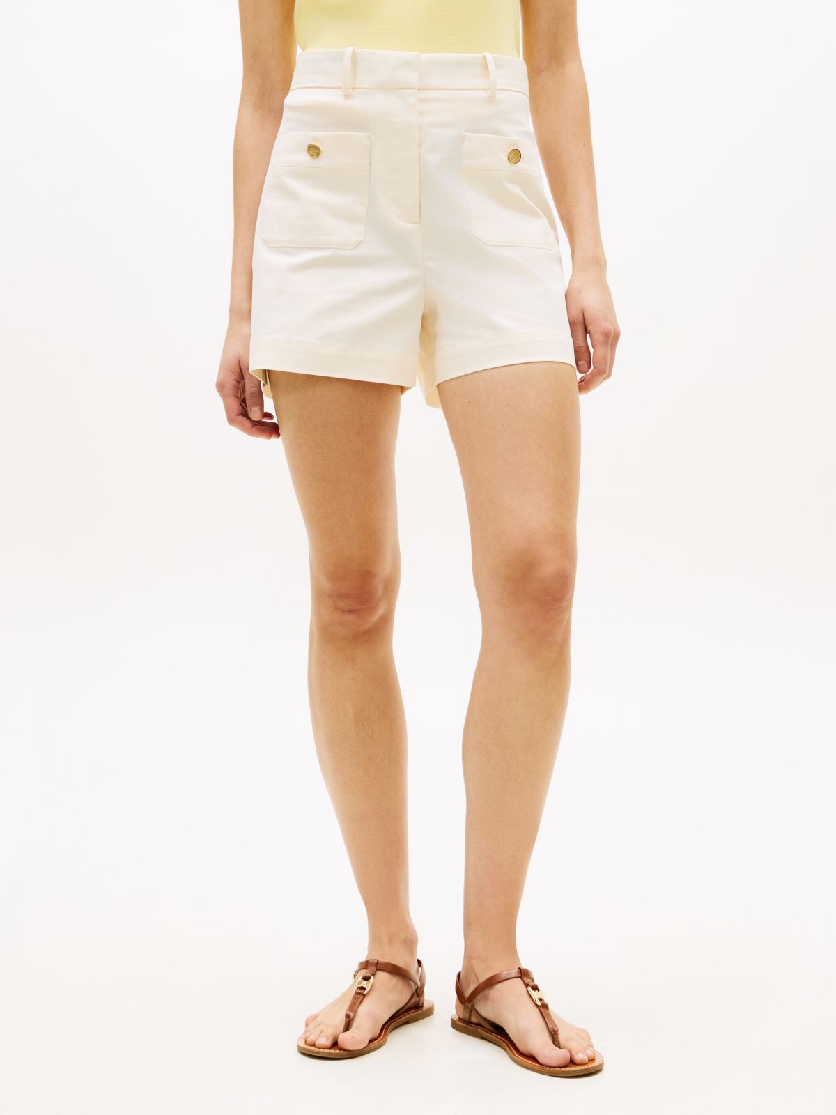 Crest Embossed Gold-Tone Button Shorts — Beige