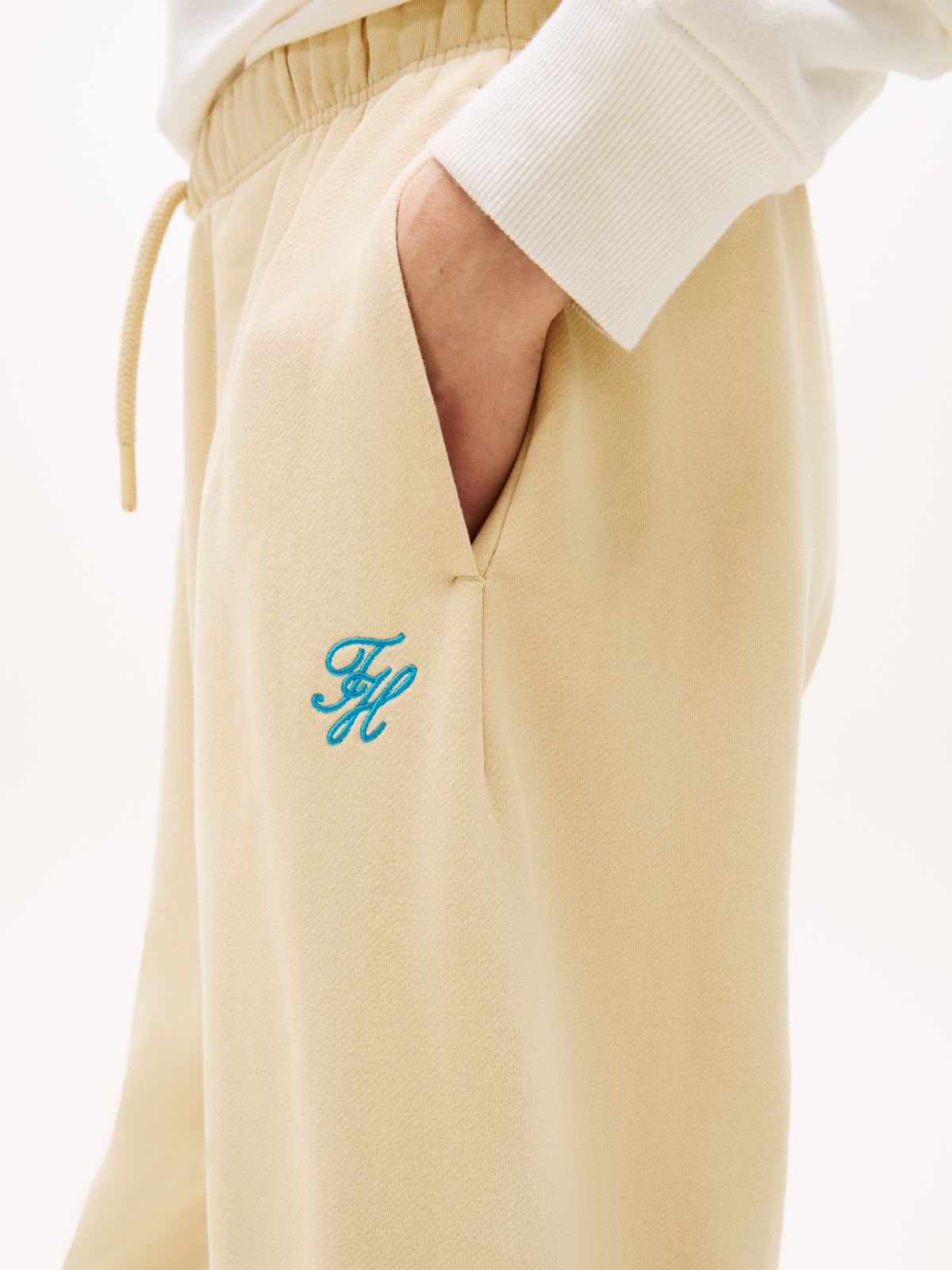 Logo Embroidery Cuffed Leg Joggers — Beige