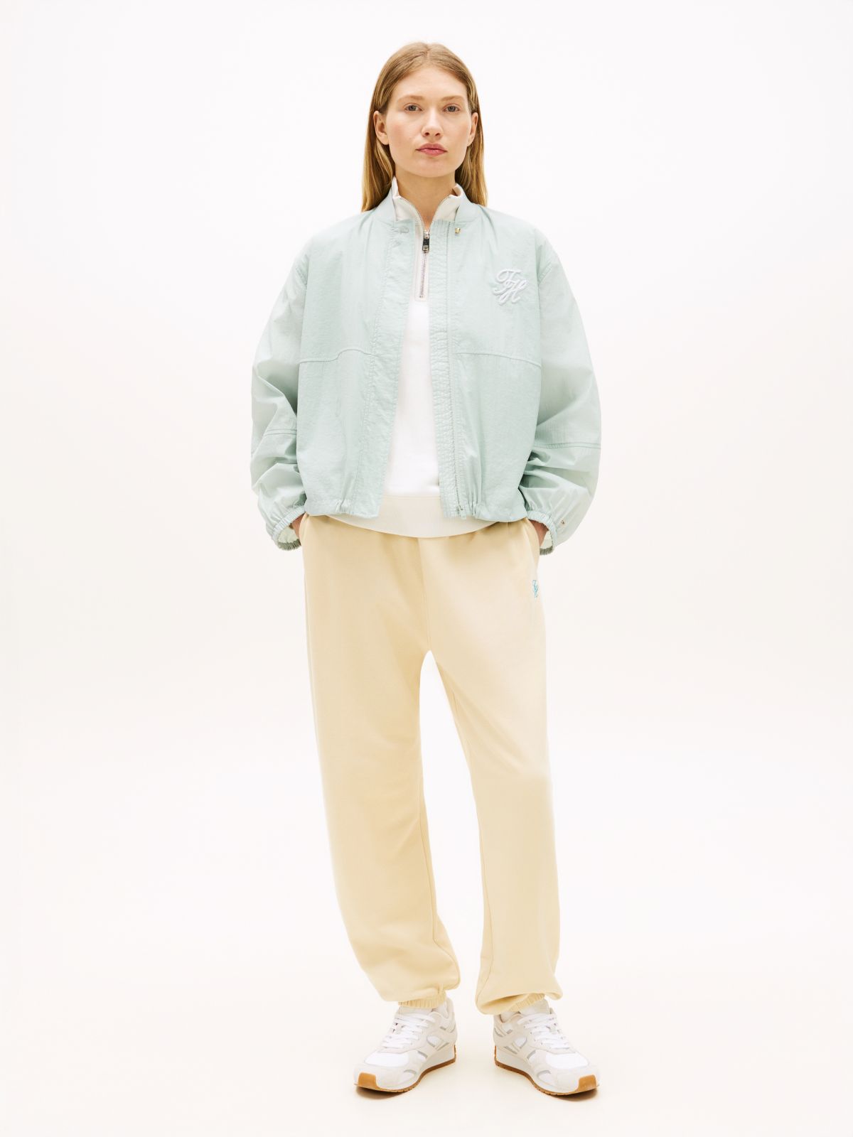 Logo Embroidery Cuffed Leg Joggers — Beige