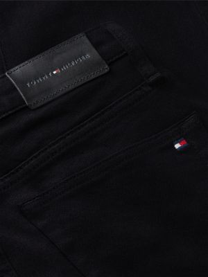 schwarz skye bootcut jeans in schwarz mit mittelhohem bund für damen - tommy hilfiger